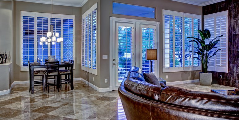 Indianapolis great room with classic shutters and modern lighting.